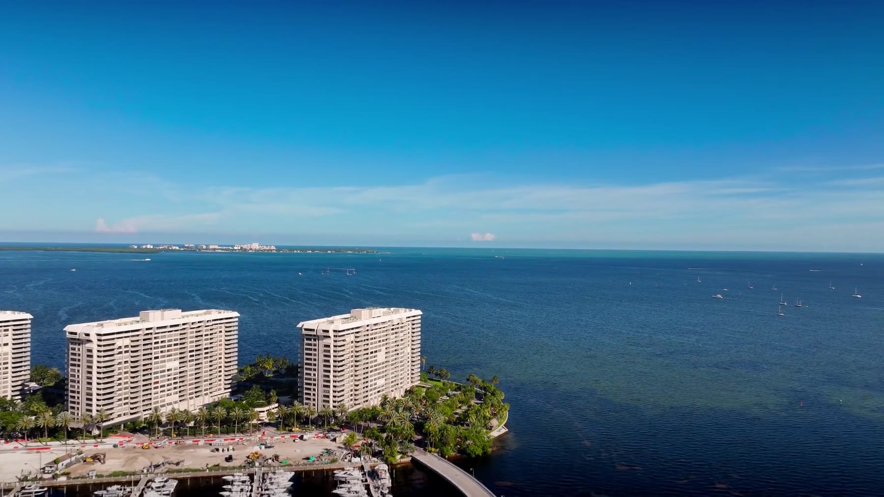Aerial footage of Florida waterfront towers, marinas and homes, illustrative